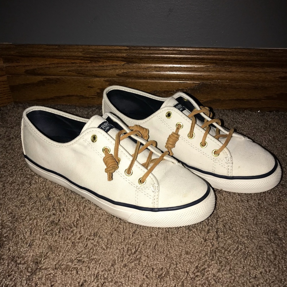 White Sperry sneakers